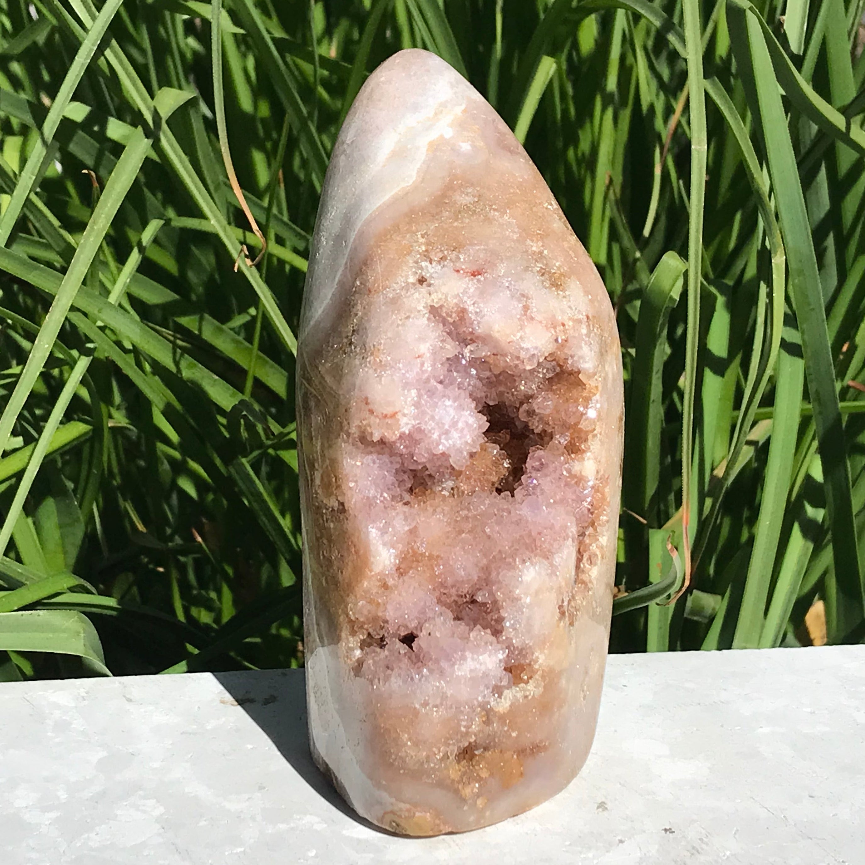 Quartz Crystals over Rose Jasper Geode
