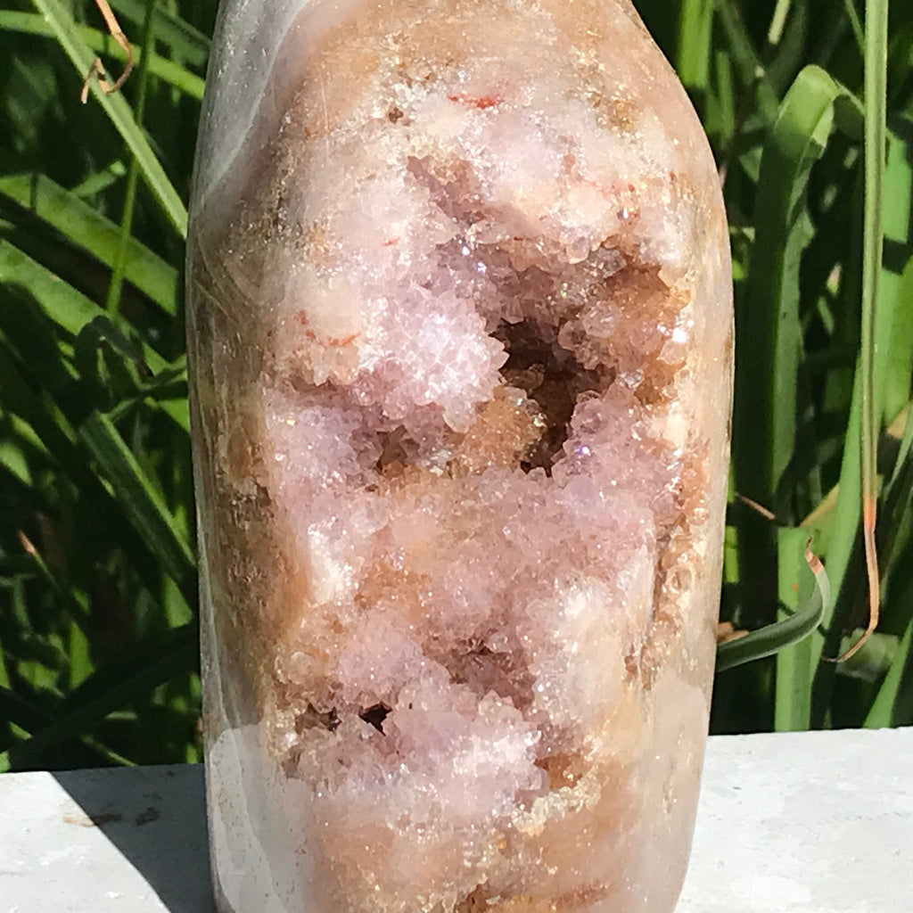 Quartz Crystals over Rose Jasper Geode