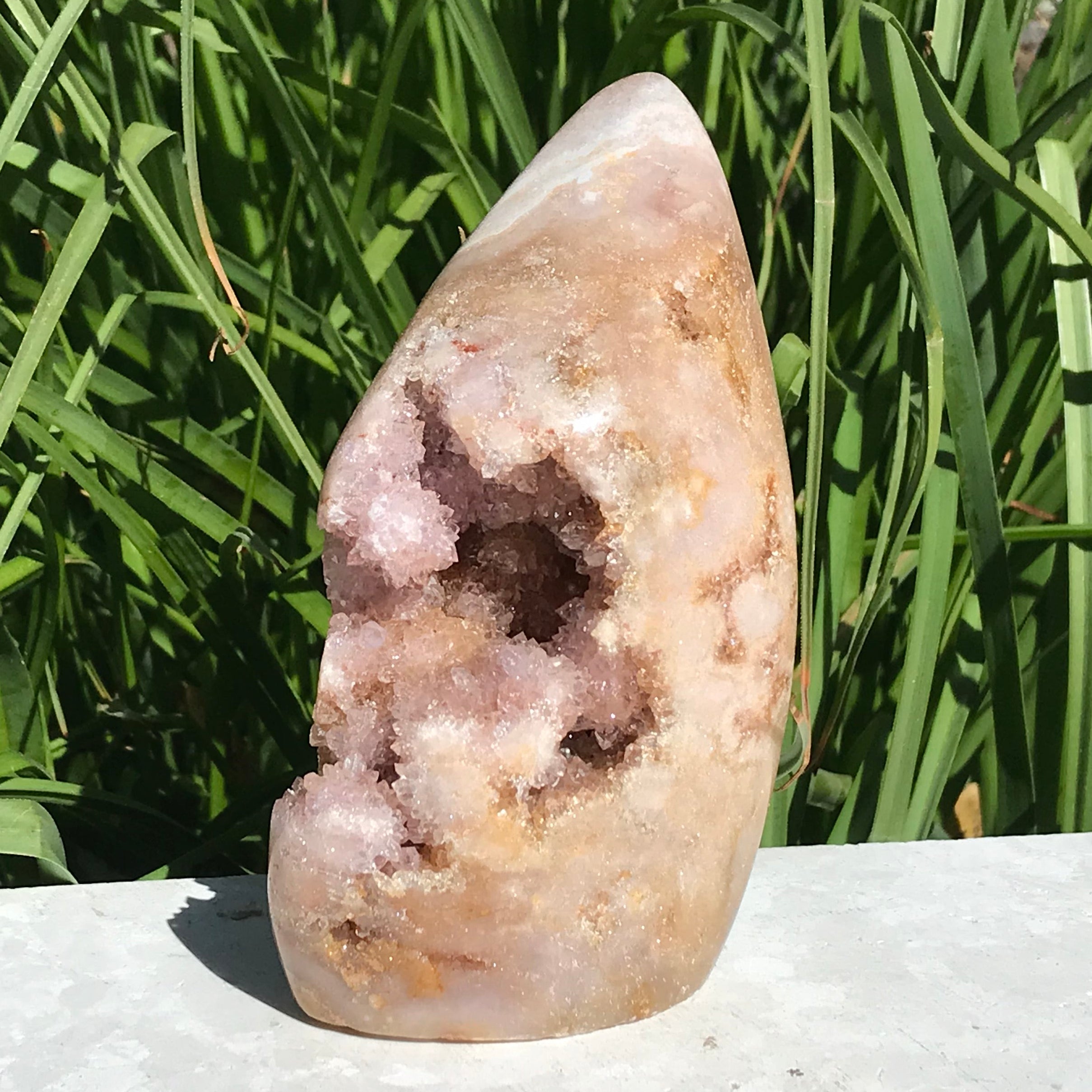 Quartz Crystals over Rose Jasper Geode