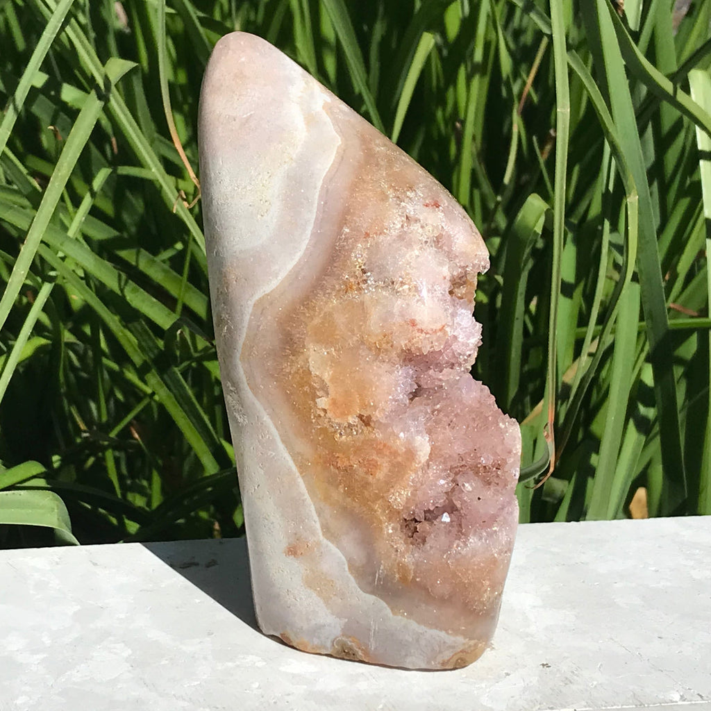 Quartz Crystals over Rose Jasper Geode