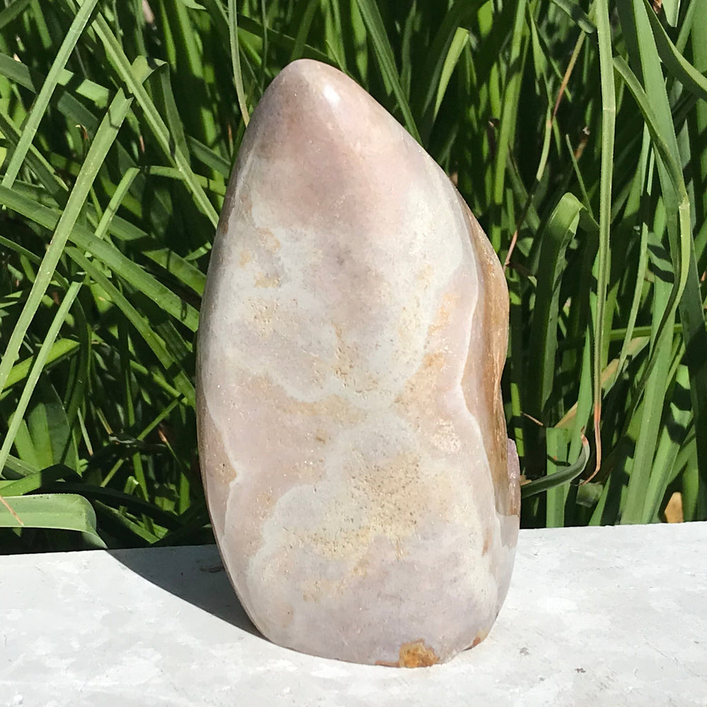Quartz Crystals over Rose Jasper Geode