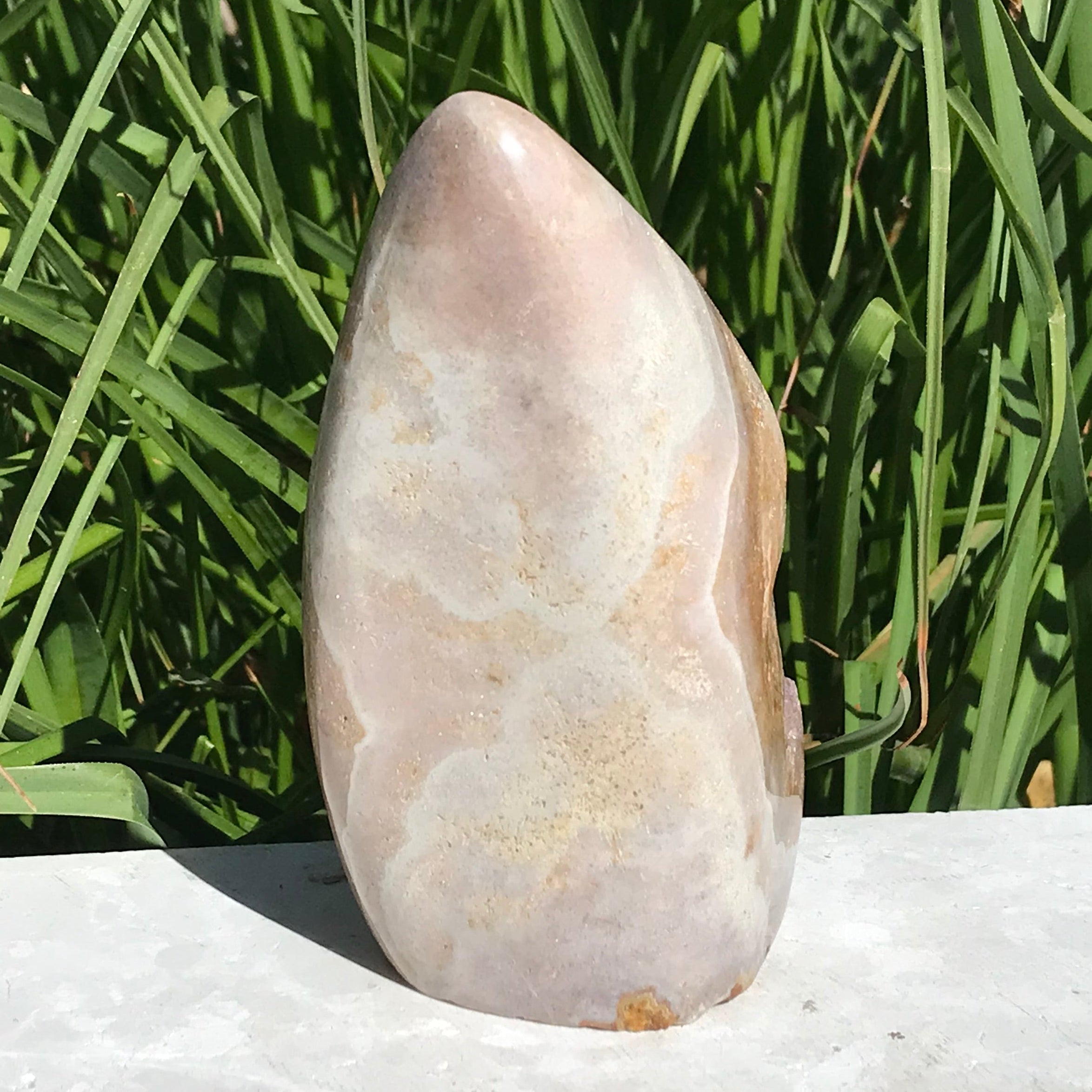 Quartz Crystals over Rose Jasper Geode