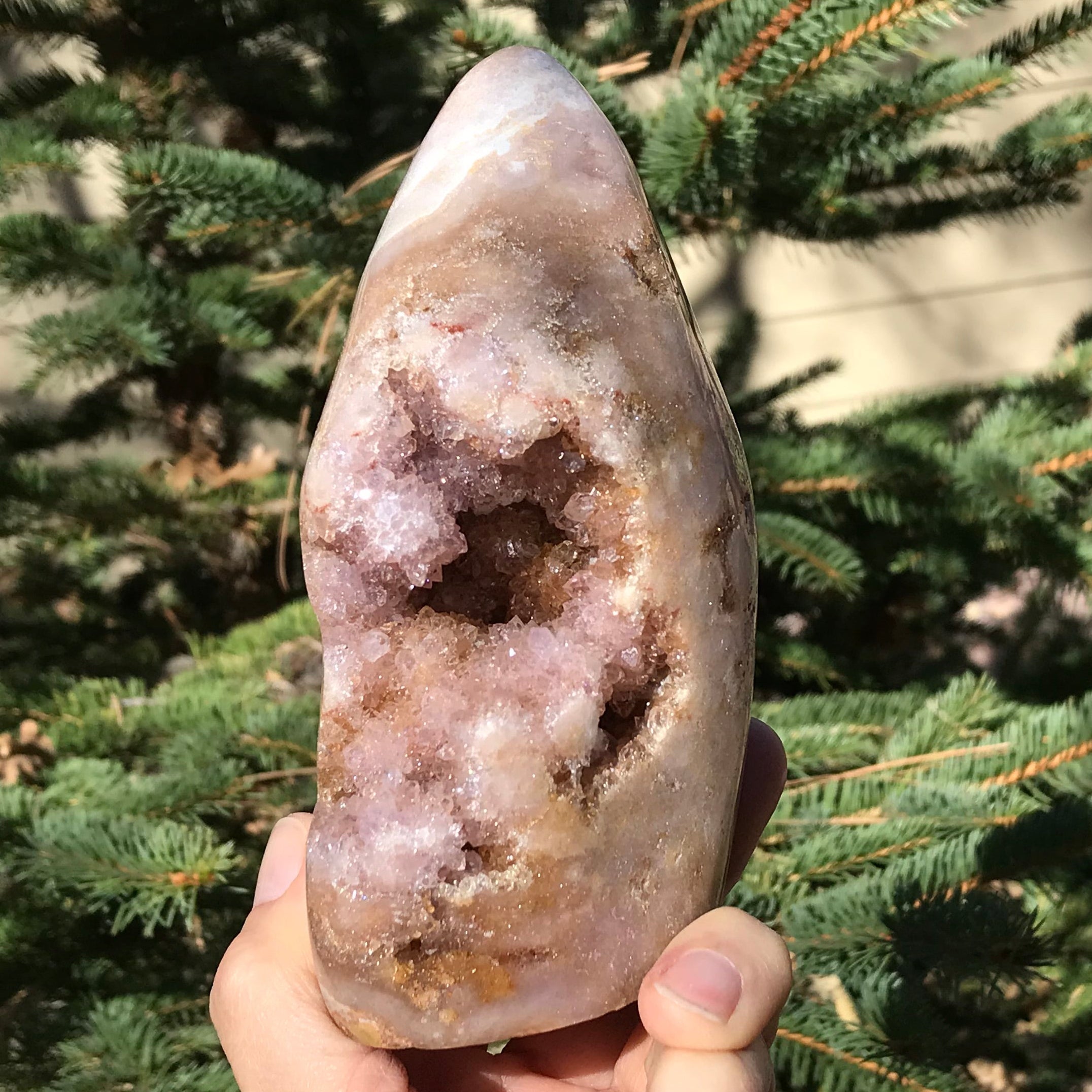 Quartz Crystals over Rose Jasper Geode