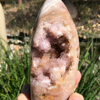 Quartz Crystals over Rose Jasper Geode