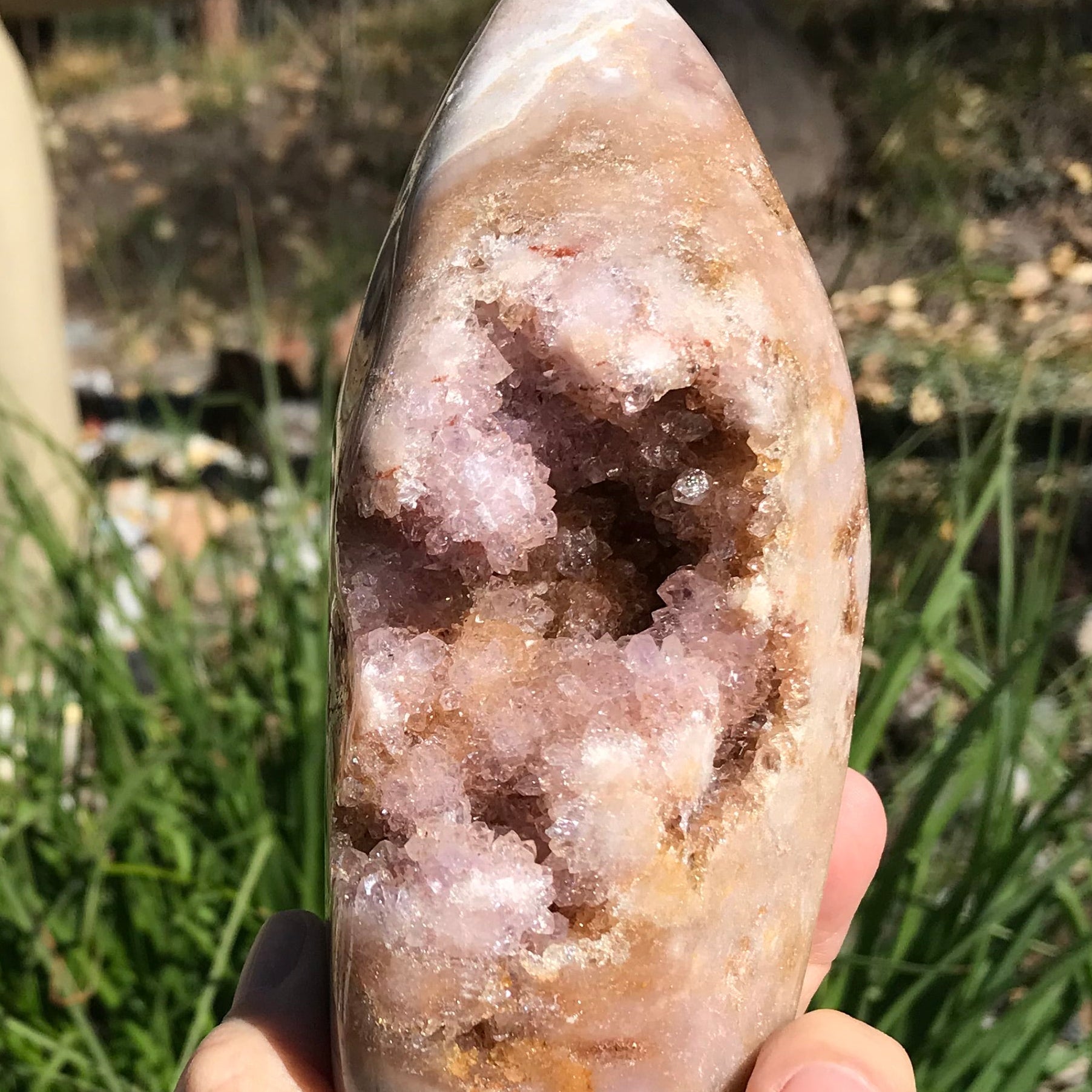 Quartz Crystals over Rose Jasper Geode