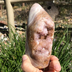 Quartz Crystals over Rose Jasper Geode